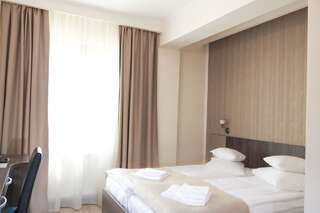 Отель Hotel Rao Клуж-Напока Стандартный двухместный номер с 2 отдельными кроватями-5